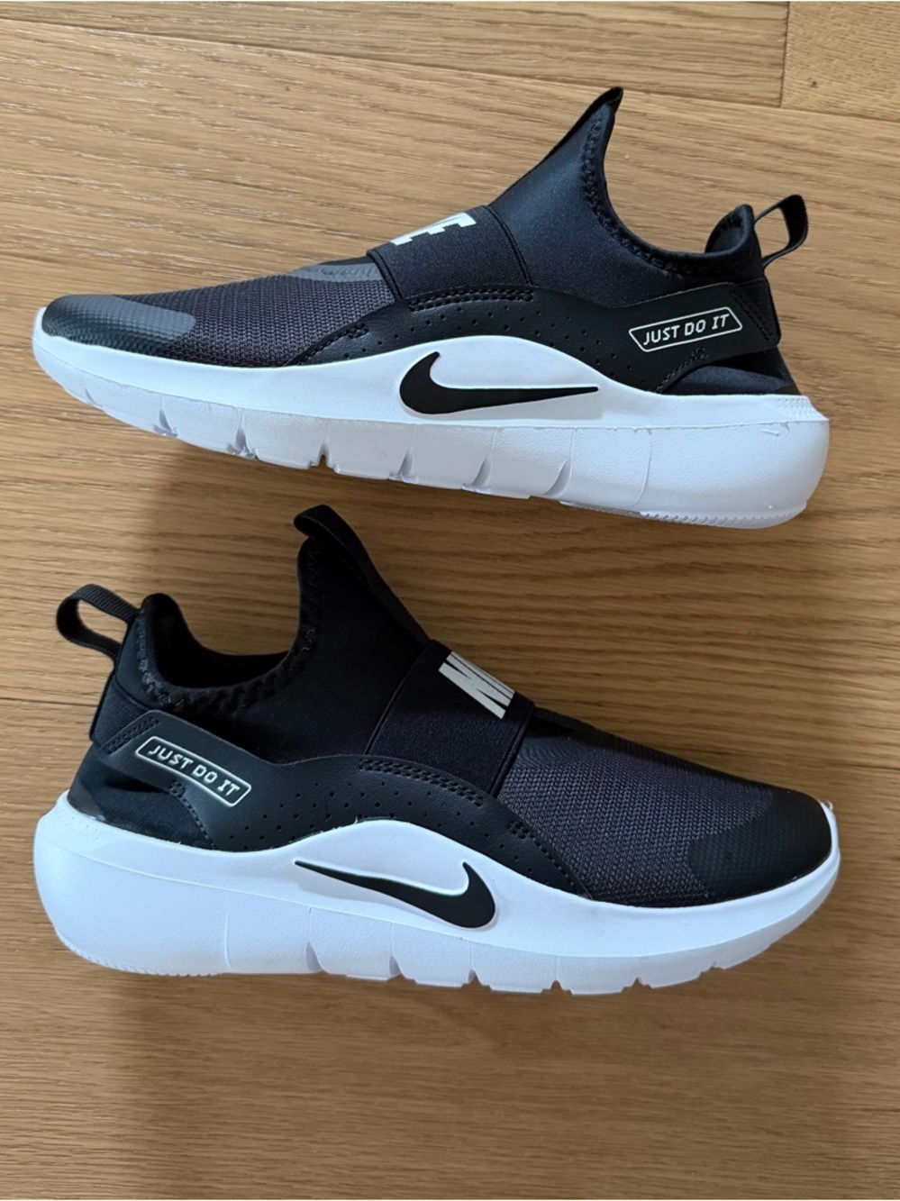 Nike Black and White Slip-On Athletic Sneakers